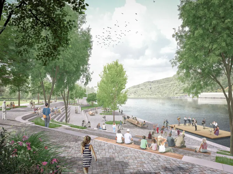 Der Uferbereich besteht aus Stufen als Sitzm&ouml;glichkeiten mit Blick auf einen schwimmenden Steg als B&uuml;hne.