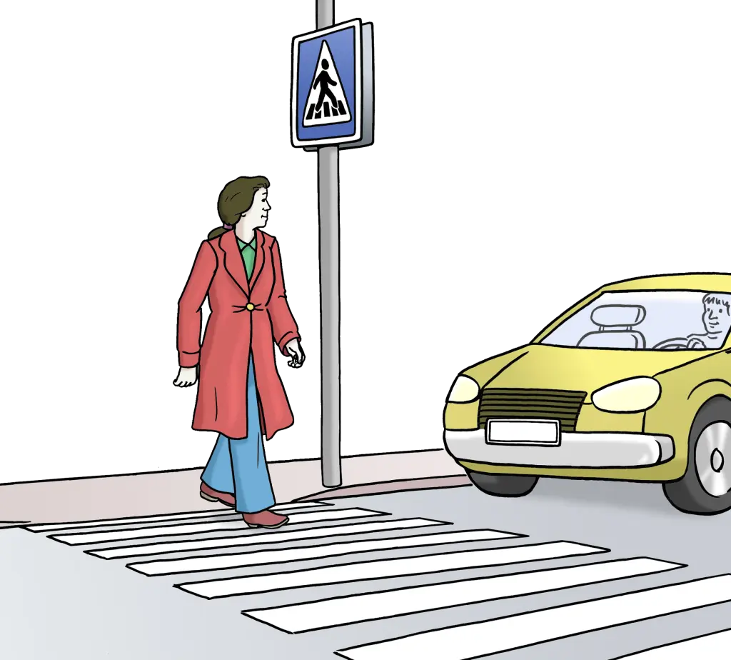 Eine Frau geht über einen Zebrastreifen. Davor wartet ein Auto.